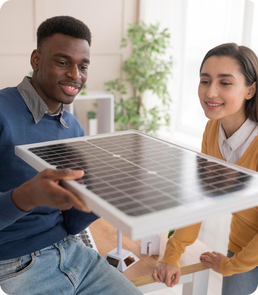 People holding solar panel