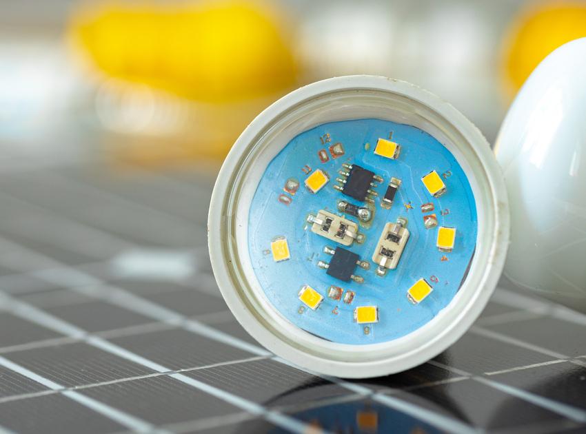 People holding solar panel